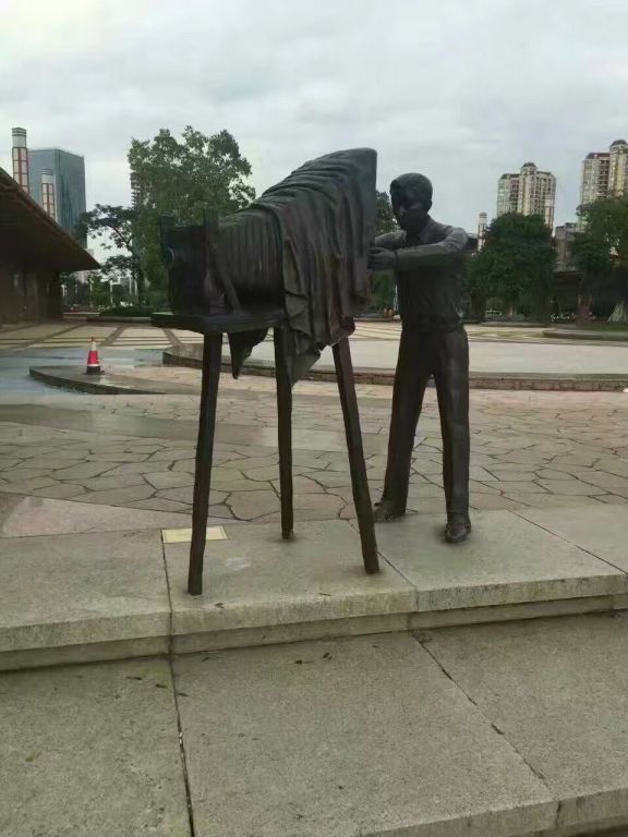 照相人物标志铜雕