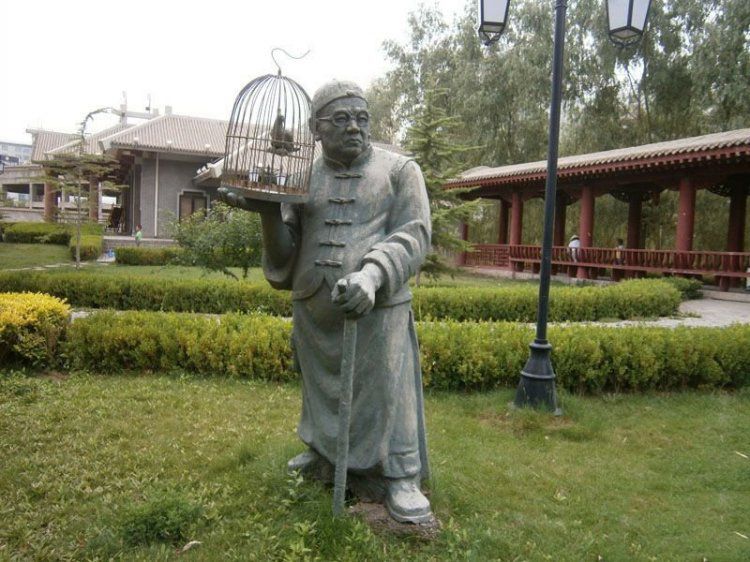 民俗遛鸟景观铜雕