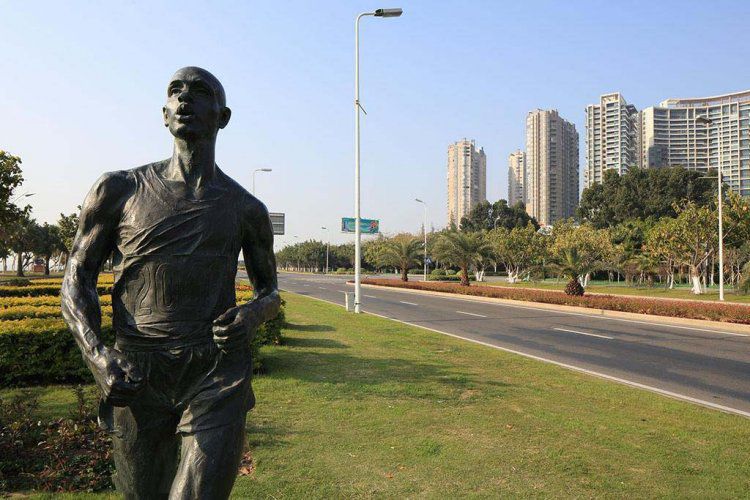 跑步运动商场人物铜雕